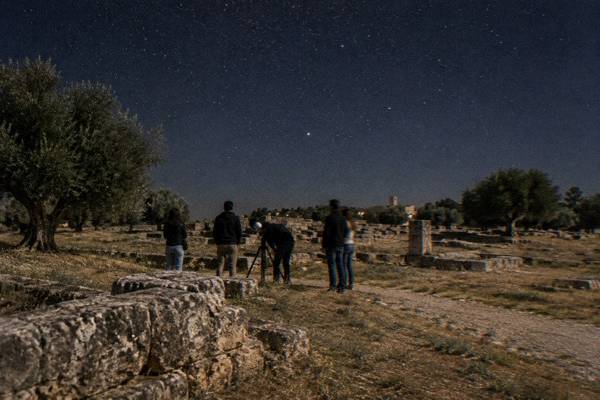 Dark open countryside under a clear sky outside Lecce
