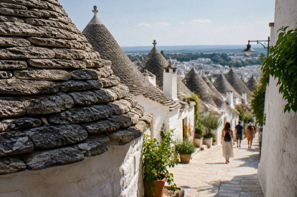 A detail of a trullo roof built from stacked grey stone slabs