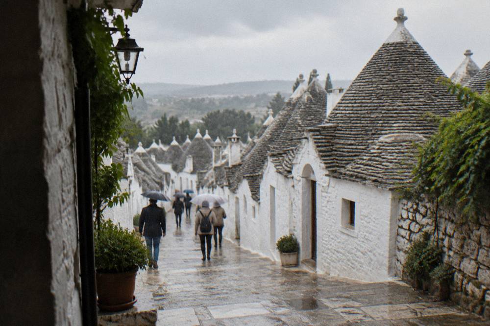 Trulli stone huts with conical roofs in the countryside near Alberobello