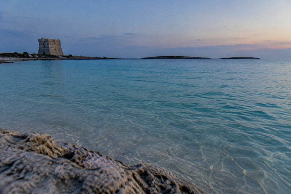 Turquoise shallow water over sand near Porto Cesareo on the Ionian coast