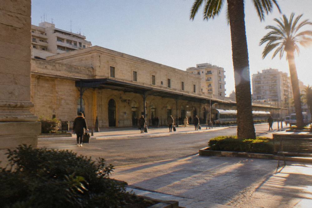 Lecce railway station forecourt on a winter afternoon