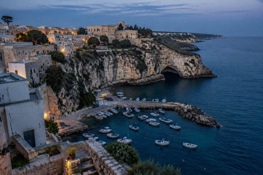 White cliffs and a sea cave entrance on the Adriatic coast near Castro
