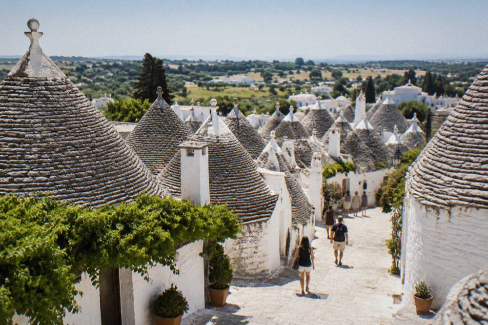 Trulli houses with cone-shaped stone roofs in the countryside around Alberobello